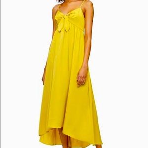 Long maxi dress with tags strap he bow in front never worn